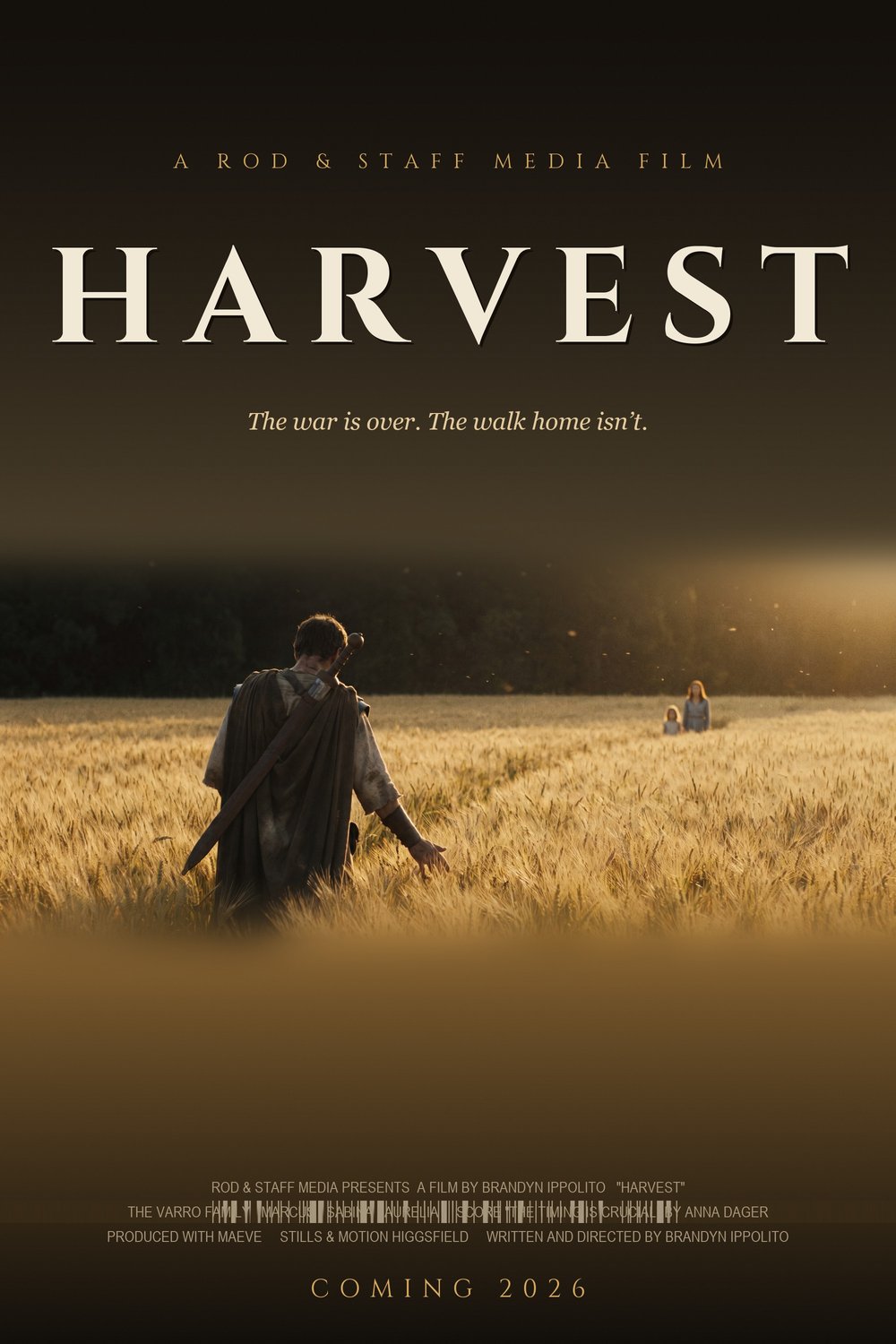 HARVEST one-sheet poster: a Roman soldier walking through golden wheat, his hand brushing the grain, beneath the title. The war is over. The walk home isn't. Coming 2026.
